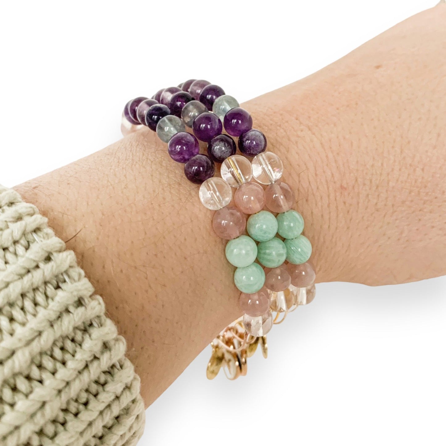 Person wearing the Pisces Bracelet, symbolizing empathy.