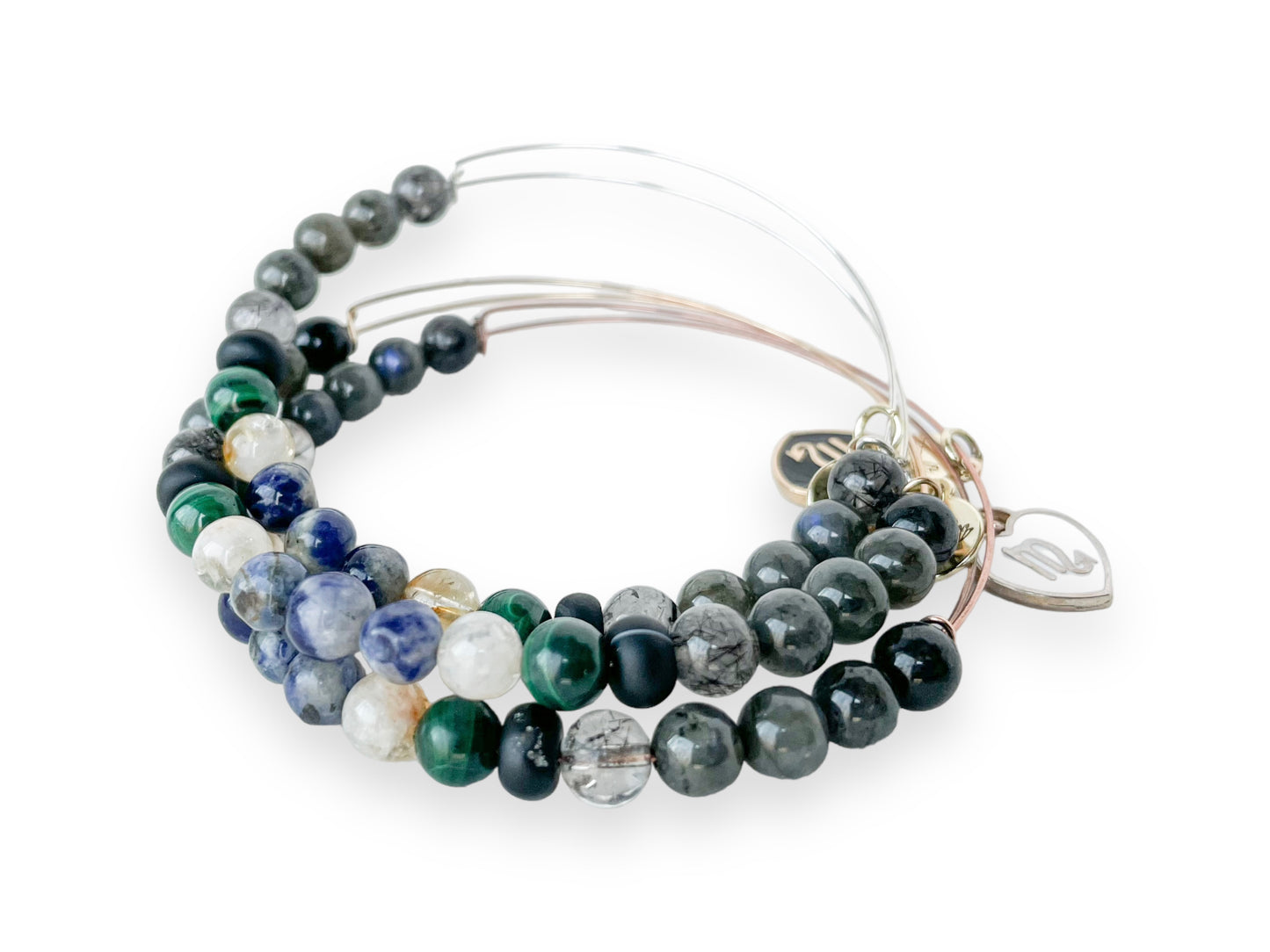 Stack of Scorpio Bracelets, illustrating the blend for passion.