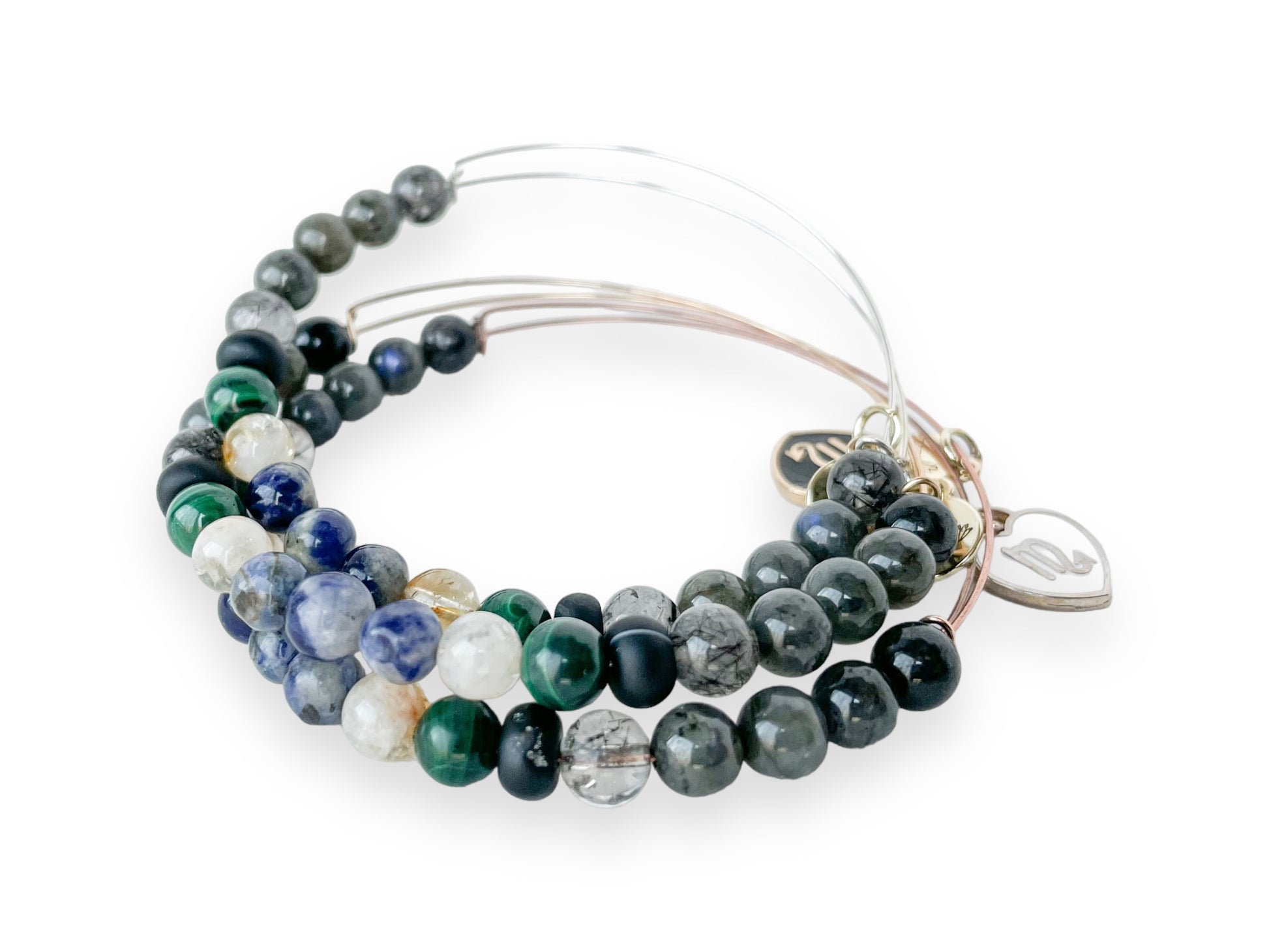 Stack of Scorpio Bracelets, illustrating the blend for passion.