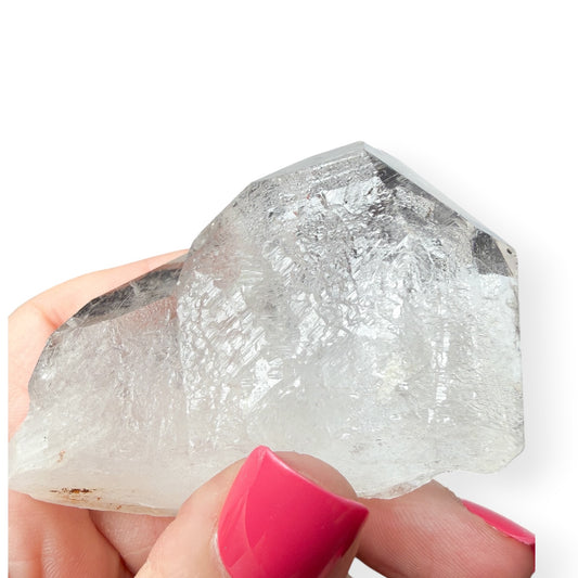 Clear quartz top view from hand of the twin points
