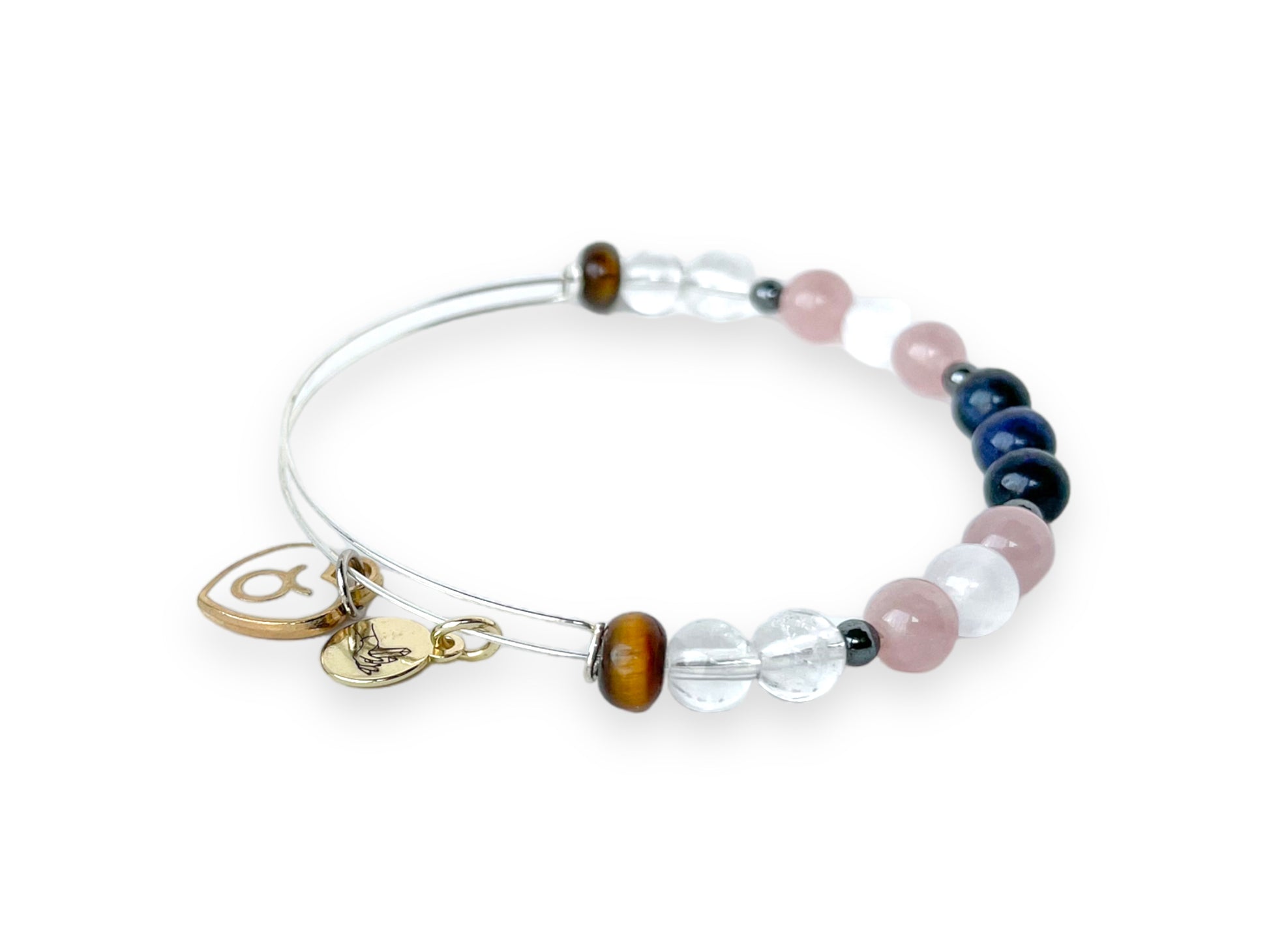Artistic display of Taurus Bracelet, highlighting Selenite and Clear Quartz.