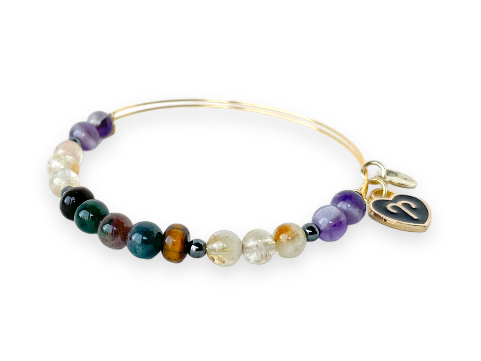 Focused shot on the Aries Bracelet's unique design for added flair.