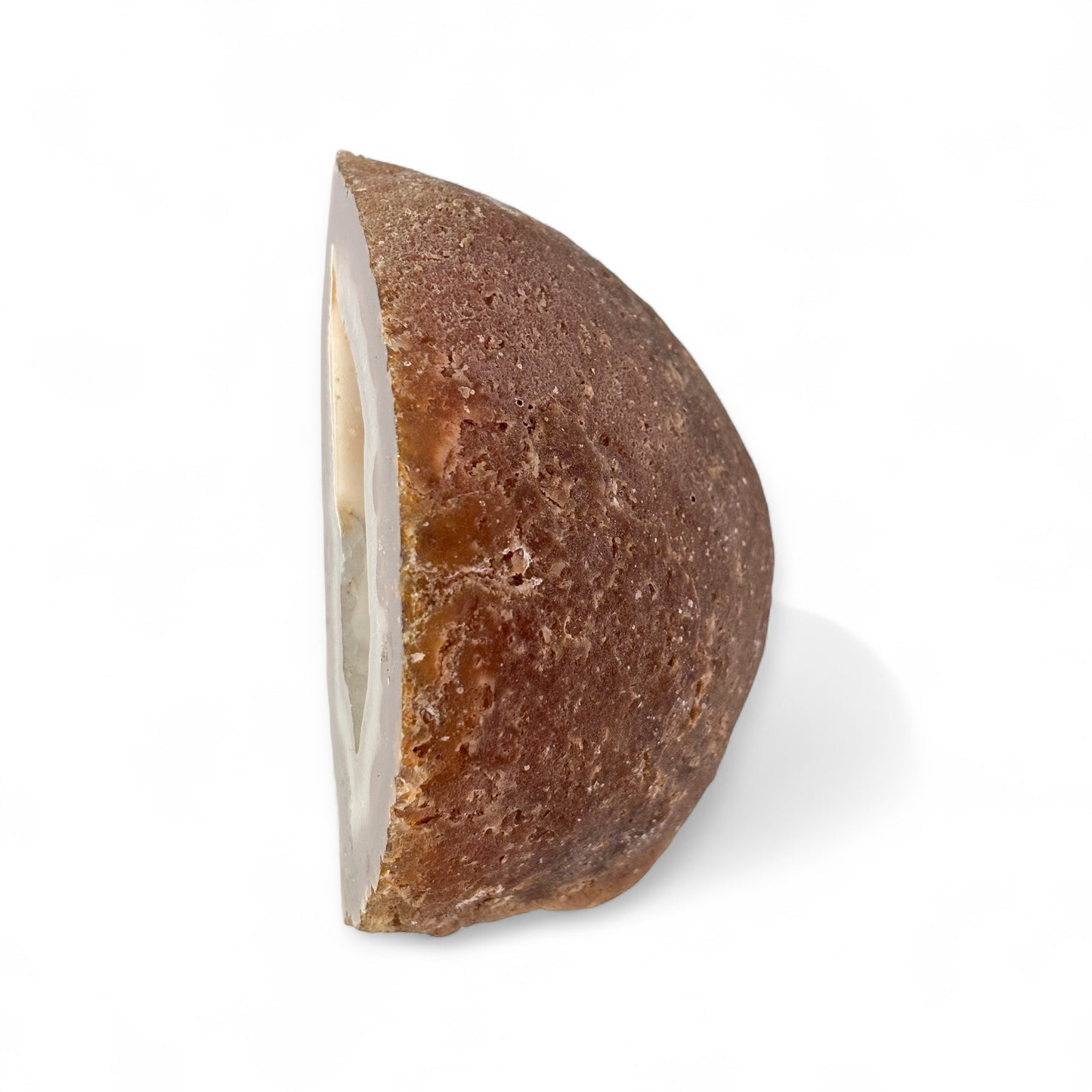 Natural geode with polished inner face and raw edge