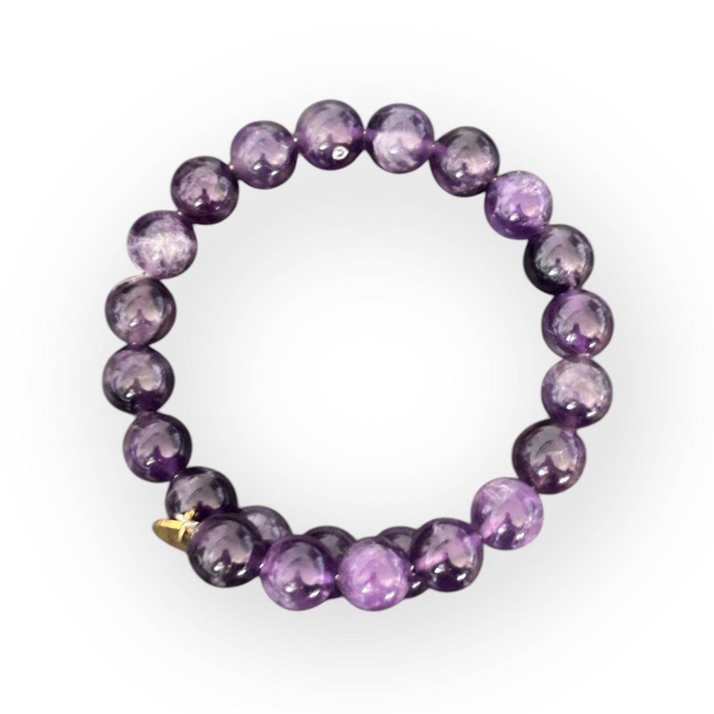 Amethyst 10mm beaded bracelet with a flexible stainless steel band for clarity and balance.