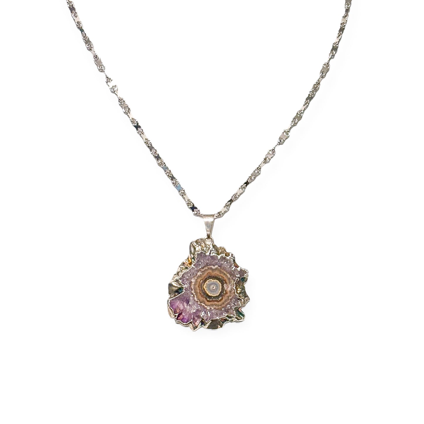 Amethyst stalactite necklace with silver-plated edges and 20-inch white gold-filled chain on white background.