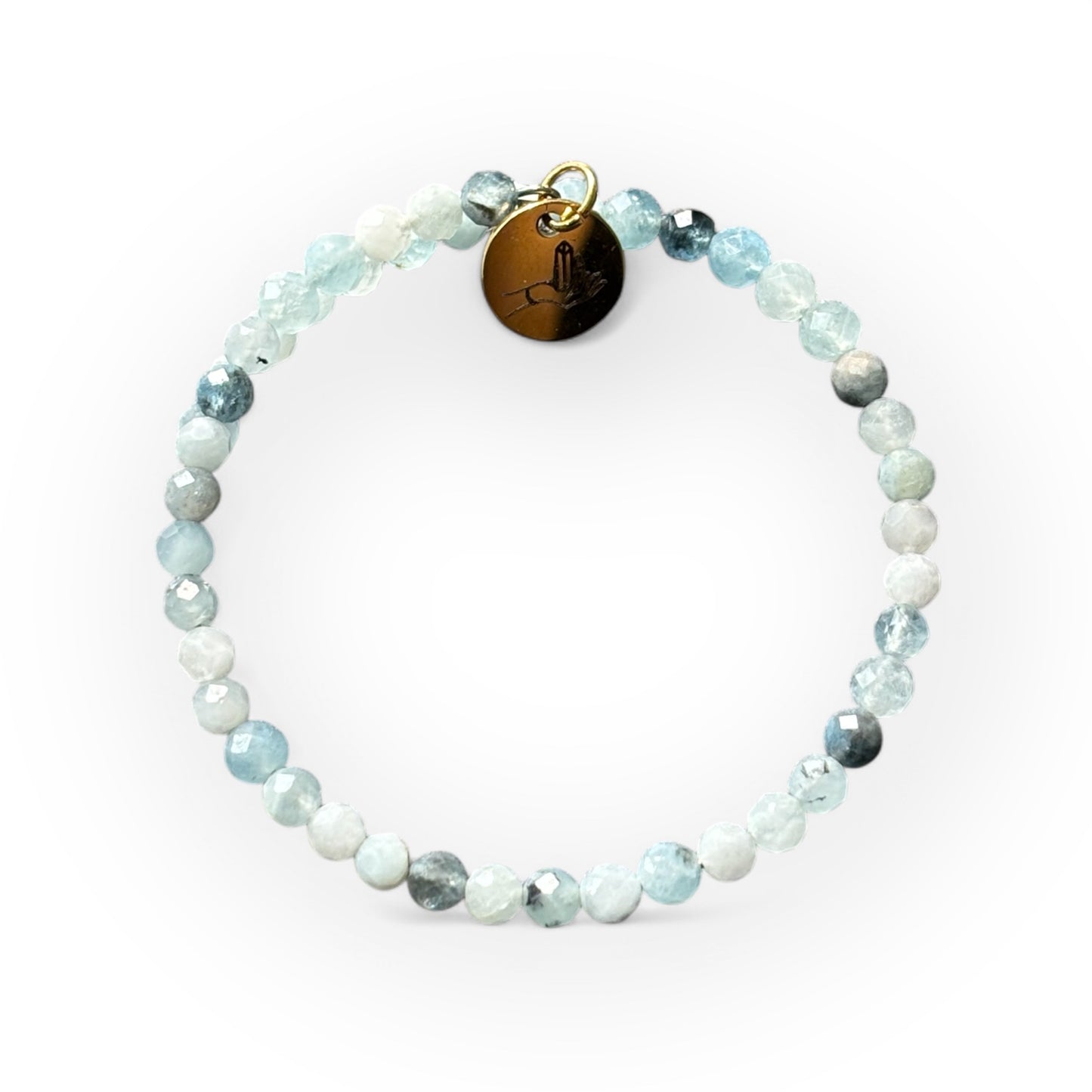 Close-up of Aquamarine wrap bracelet showcasing its delicate shimmer and soothing blue tones.