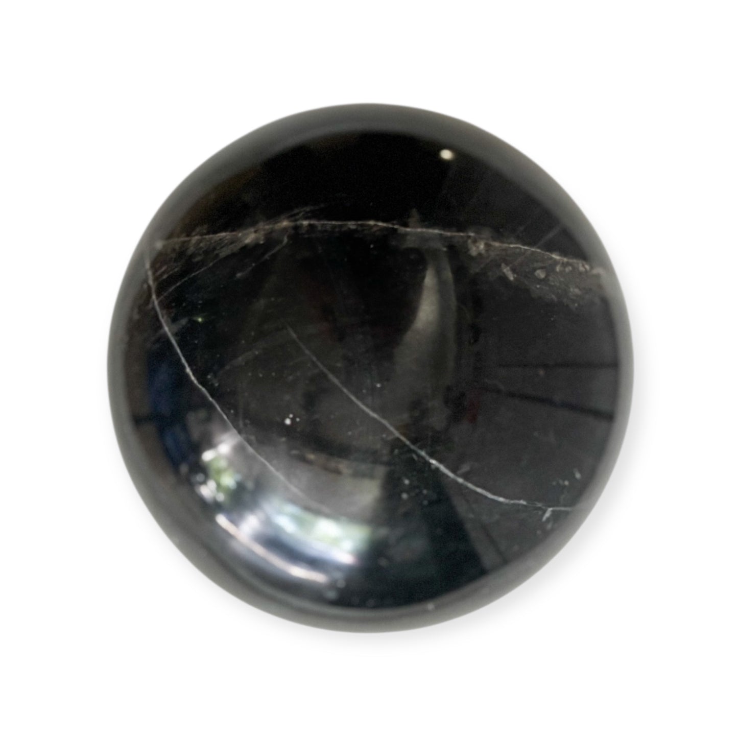 11 lb black marble sphere with white veining, side view