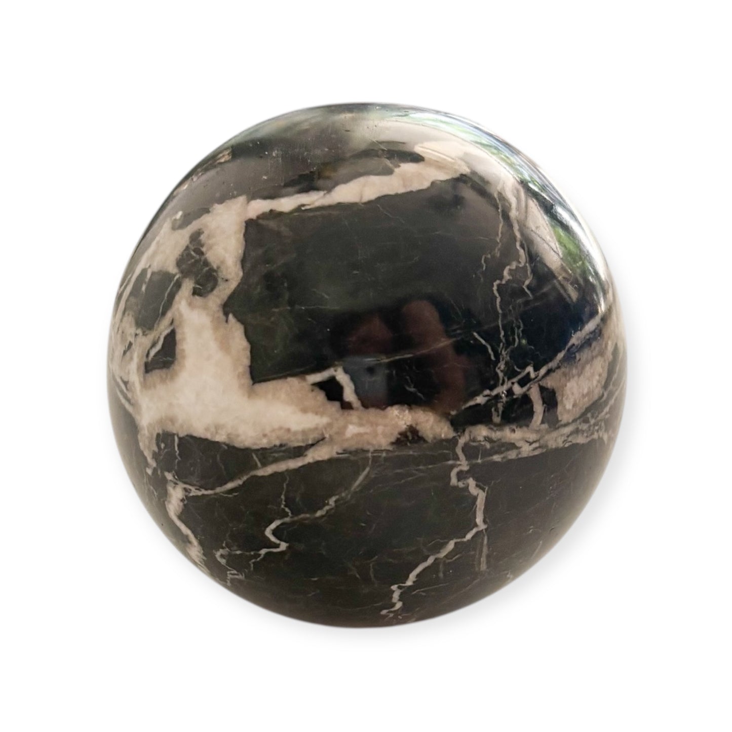 Top-down view of Black Marble Sphere with natural white streaks