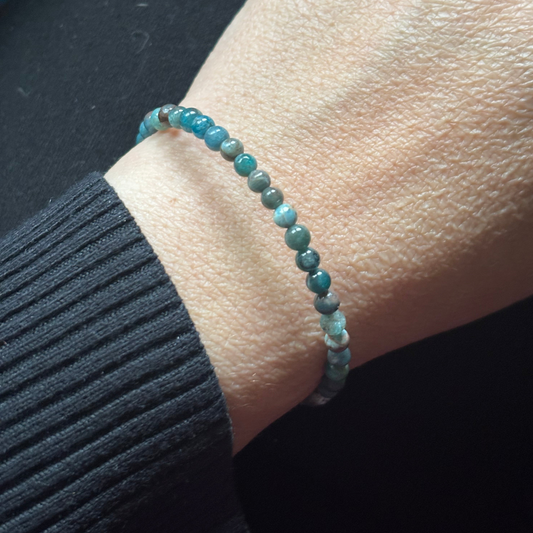 Stainless steel flexible band detail on Blue Apatite wrap bracelet