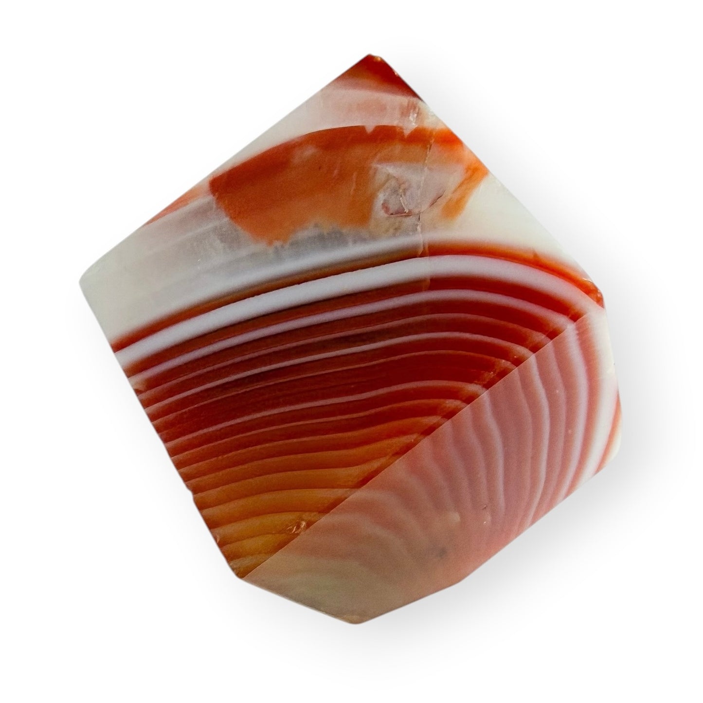 Carnelian Agate self-standing cube showing layered orange and white fortification-style banding.