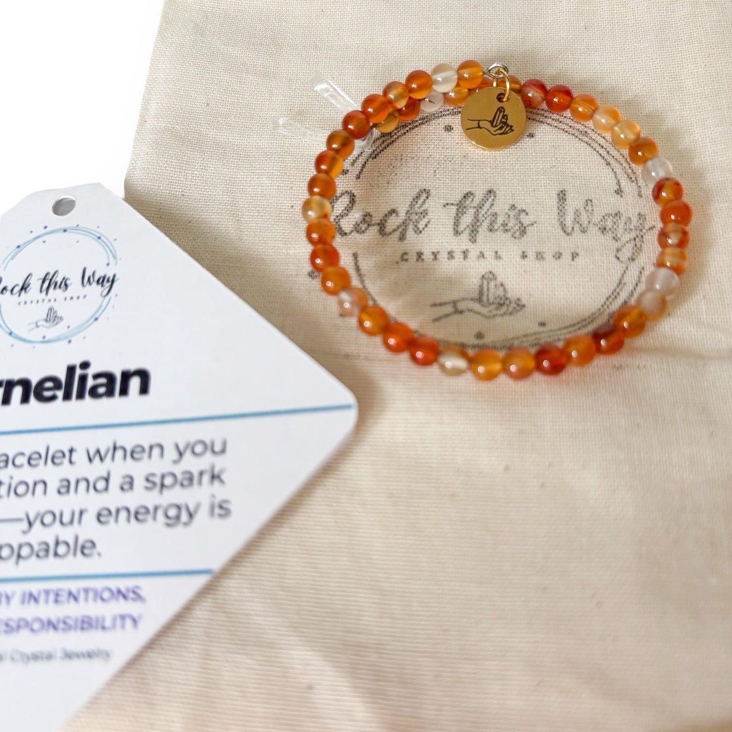 Carnelian wrap bracelet with 4mm orange-red beads with gift packaging and bracelet card.