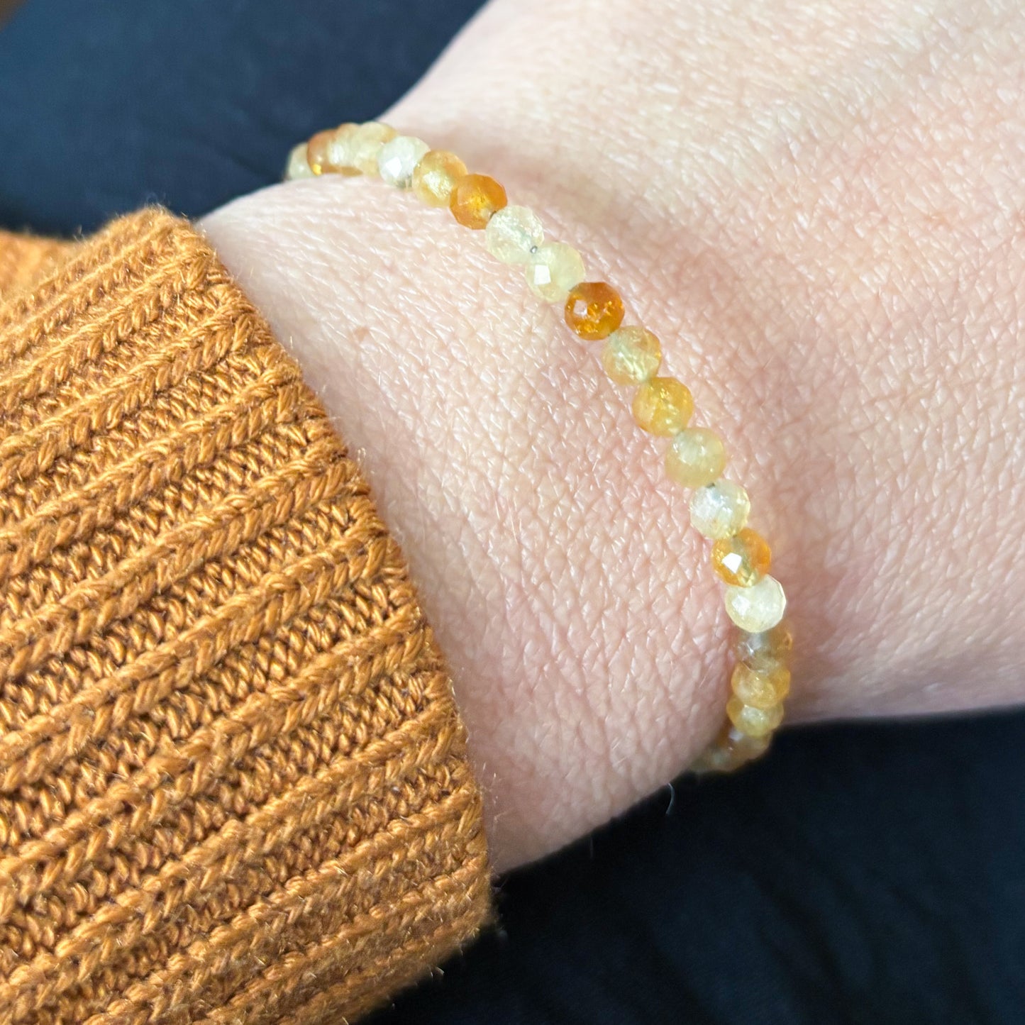Citrine bracelet styled on wrist with casual outfit in natural light