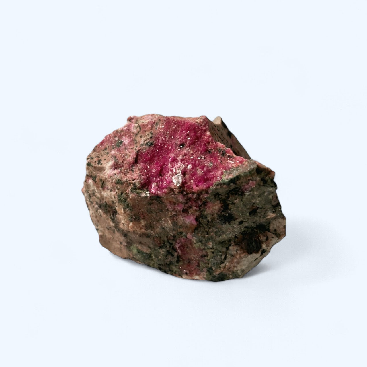 Front view of raw pink Cobalto Calcite crystal with vibrant magenta clusters