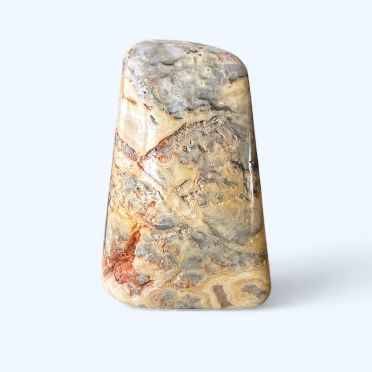 Crazy Lace Agate freeform crystal with swirls of yellow, gray, and rust – front view