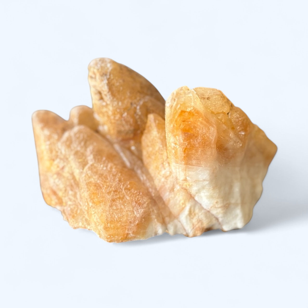 Dogtooth Calcite cluster with golden points and raw formation – front view