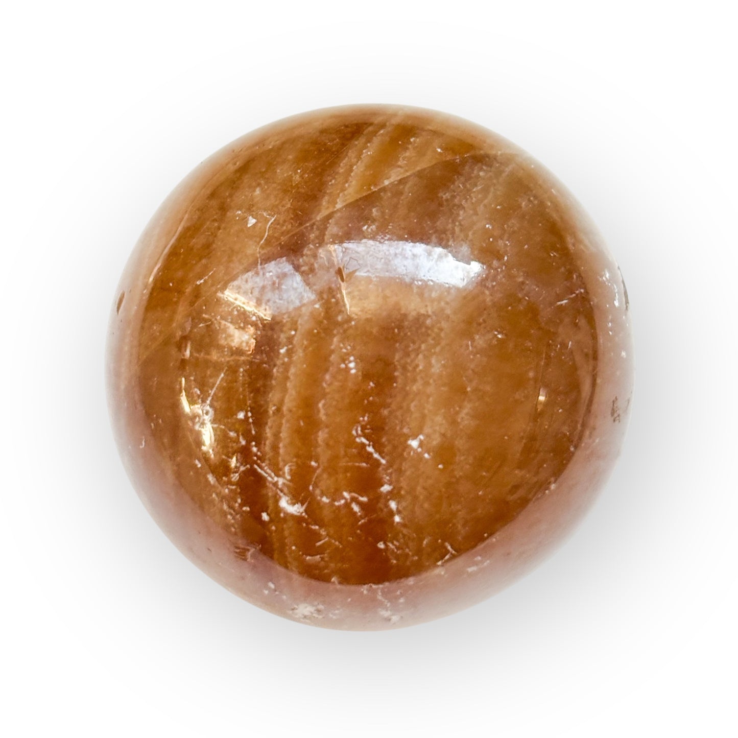 Side view of Honey Calcite Sphere showing natural banding