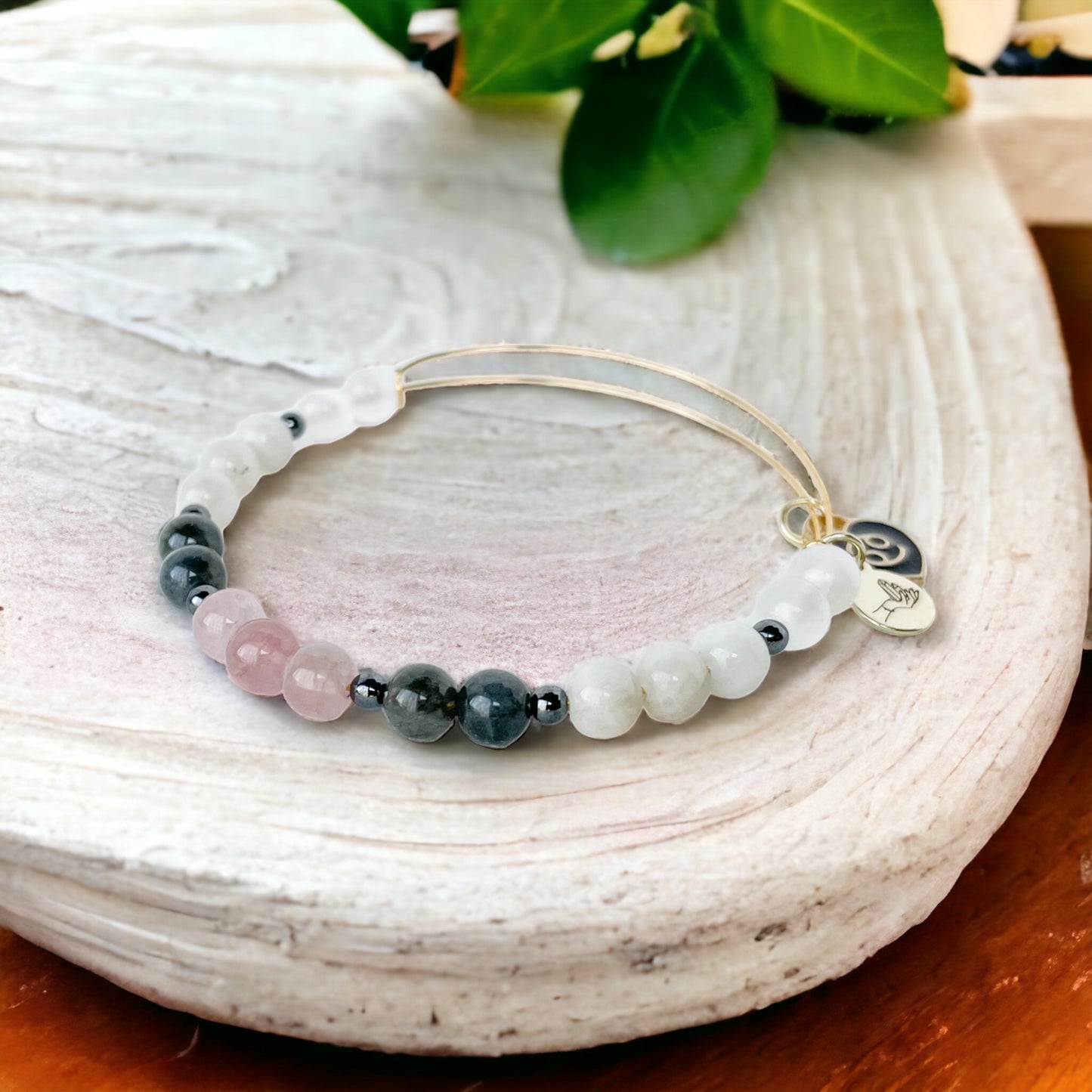 Cancer Bracelet against a serene backdrop, reinforcing its nurturing nature.