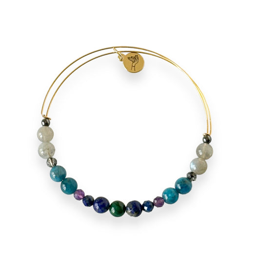 Intuition Crystal Bracelet laid flat with card and gift pouch