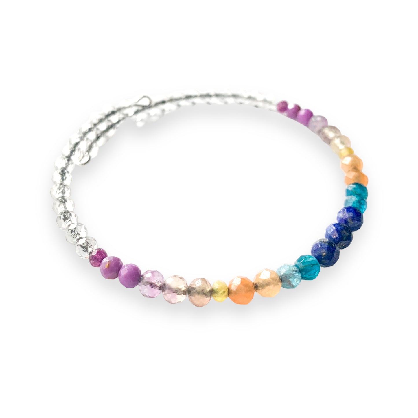 Close-up of joyful gemstone bracelet featuring Lapis, Apatite, and Ruby