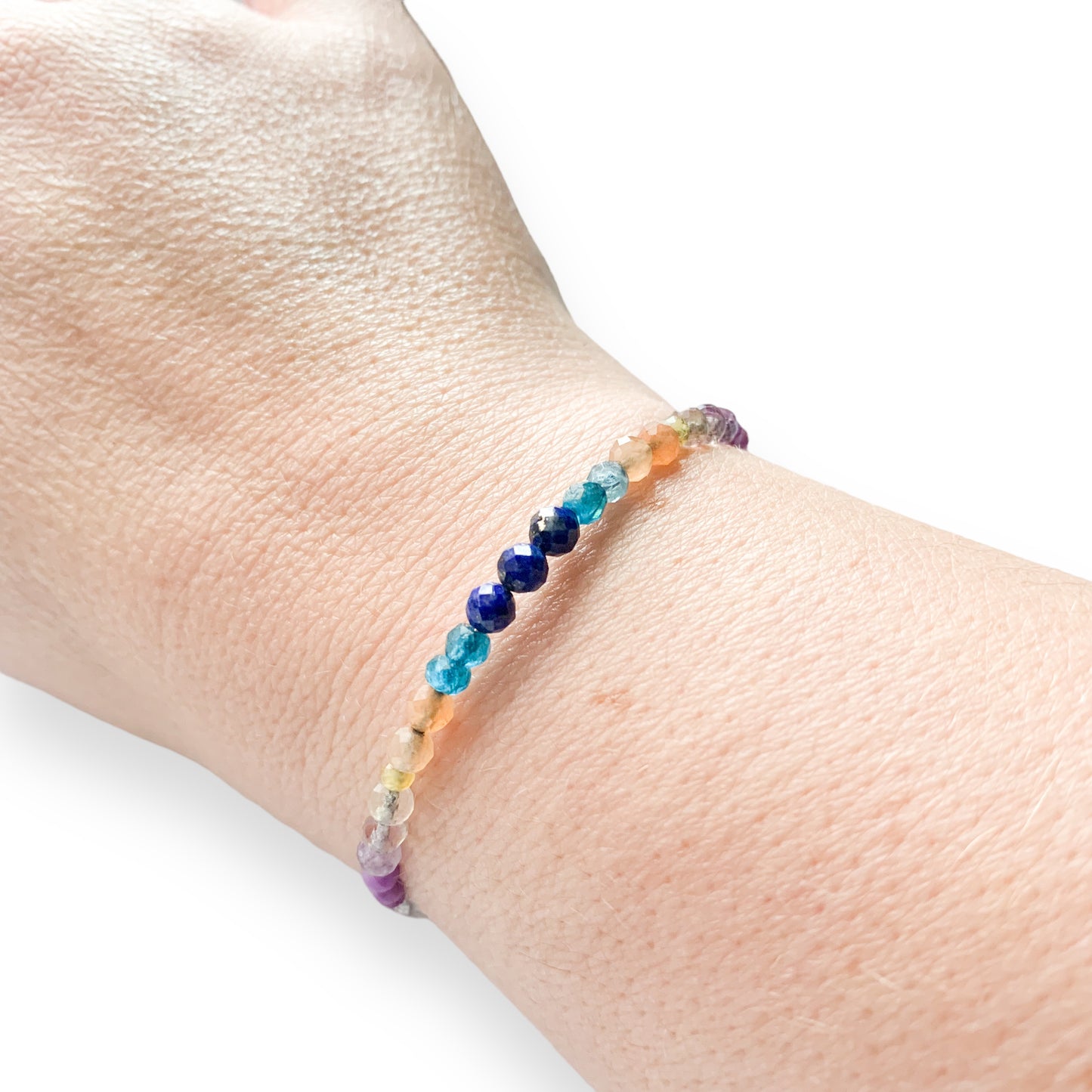 Joy wrap bracelet worn on wrist with colorful crystal beads and flexible fit