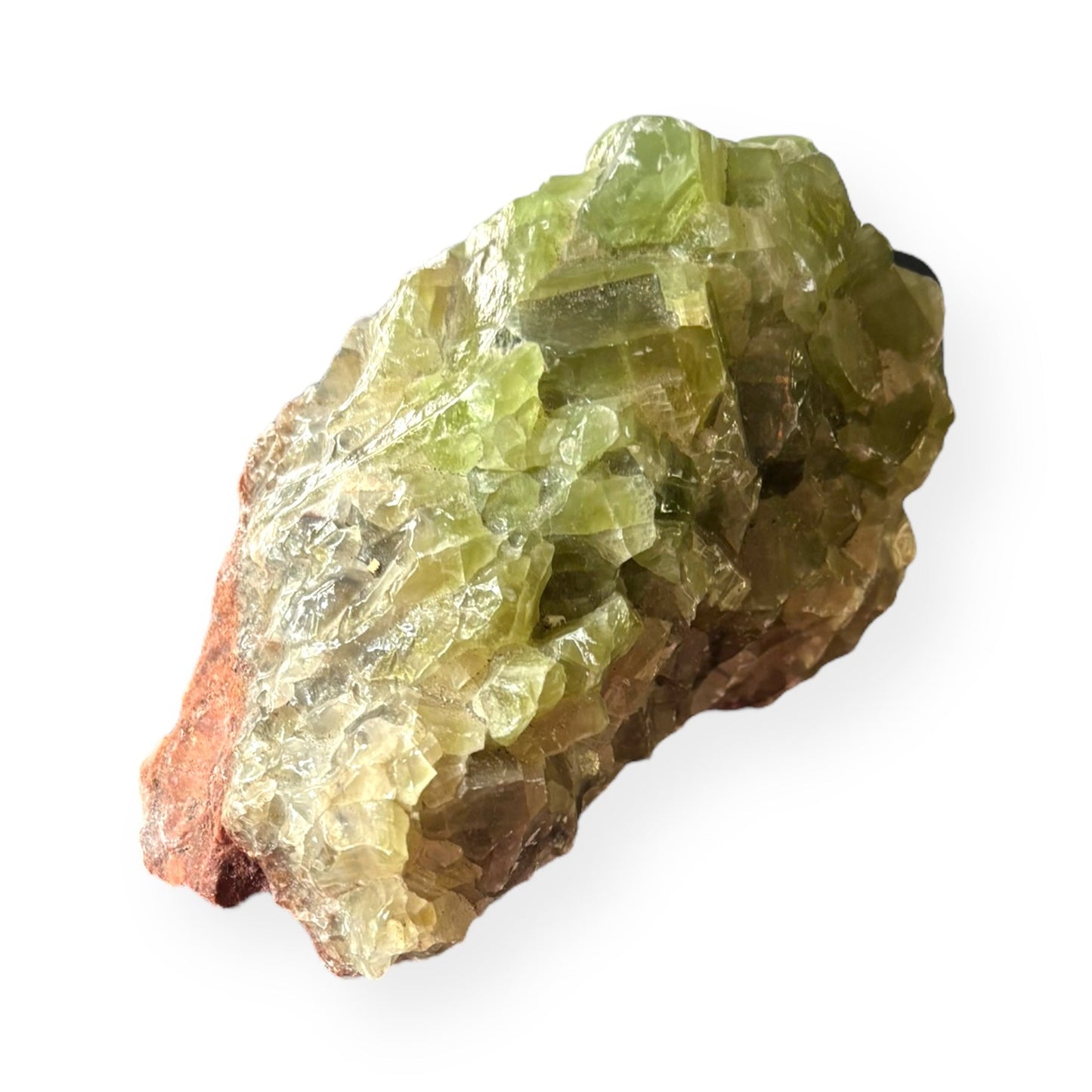 Side view of Large Green Calcite cluster showing layered green crystal formations and natural shine.