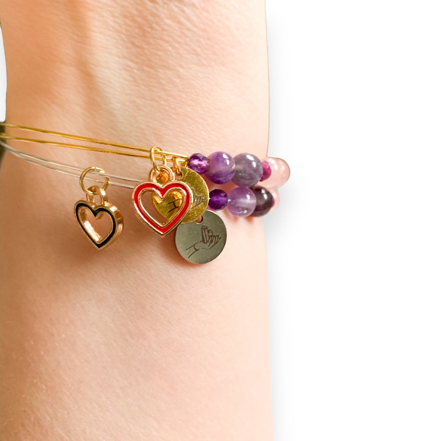 Love Crystal Bracelet with red heart charm worn on wrist