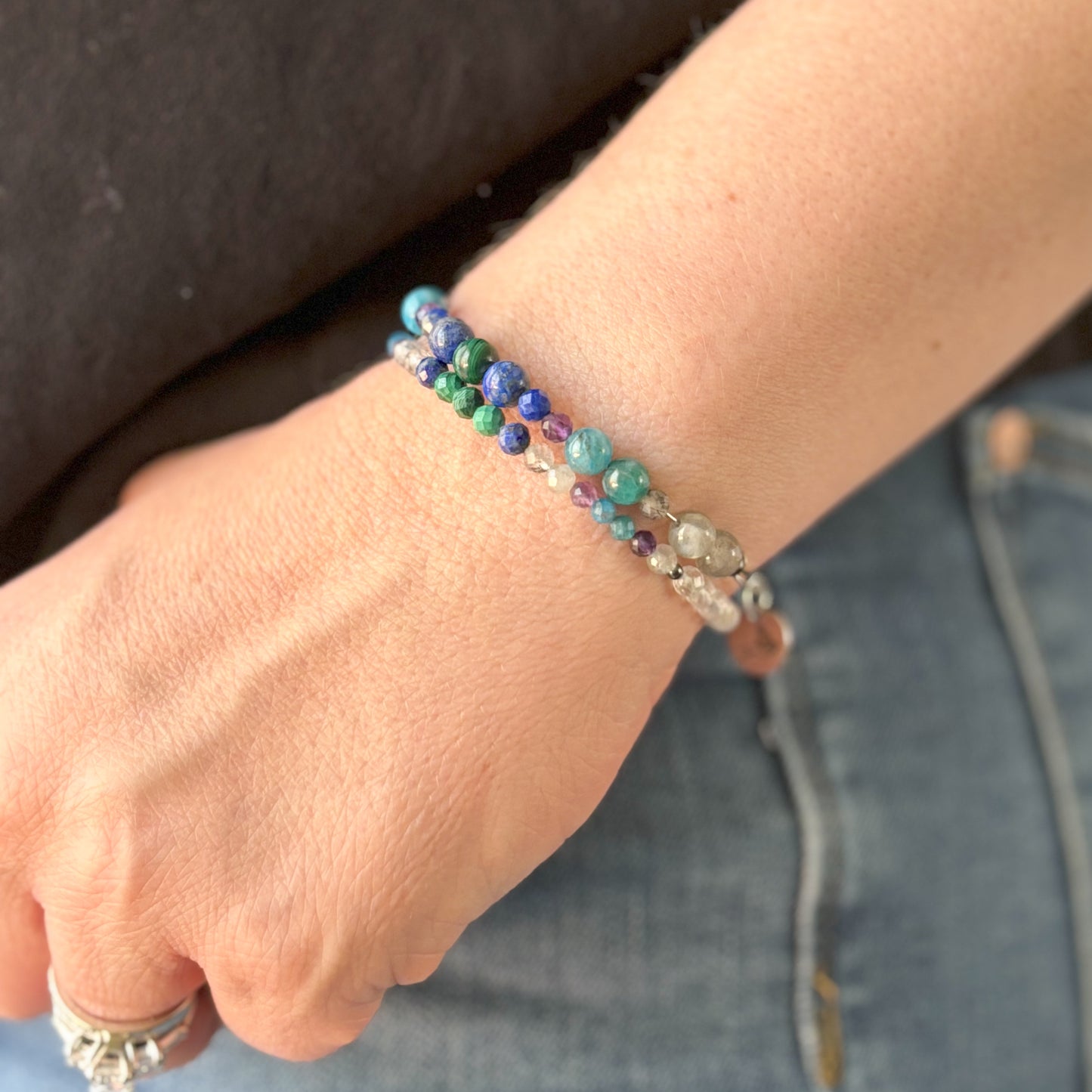Close-up of Intuition Wrap Bracelet featuring Malachite, Lapis Lazuli, and Amethyst beads.
