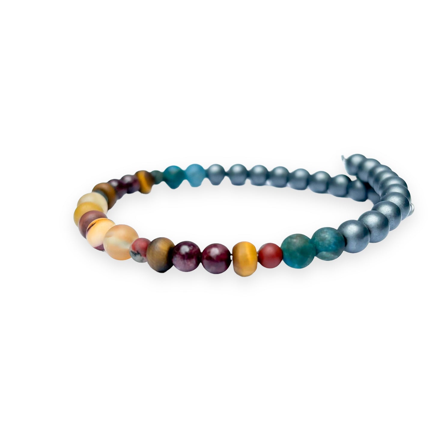 Side view of men’s crystal bracelet on flexible stainless steel band with natural matte beads