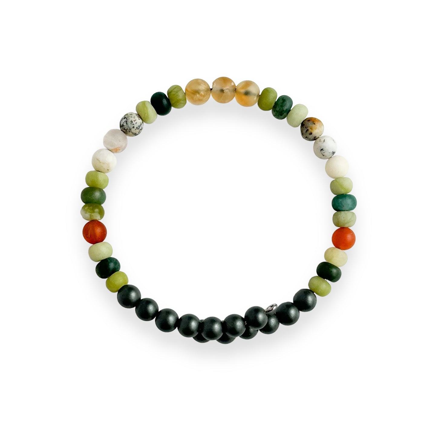 Flat lay of Men’s Success Bracelet with success meaning card and raw crystals
