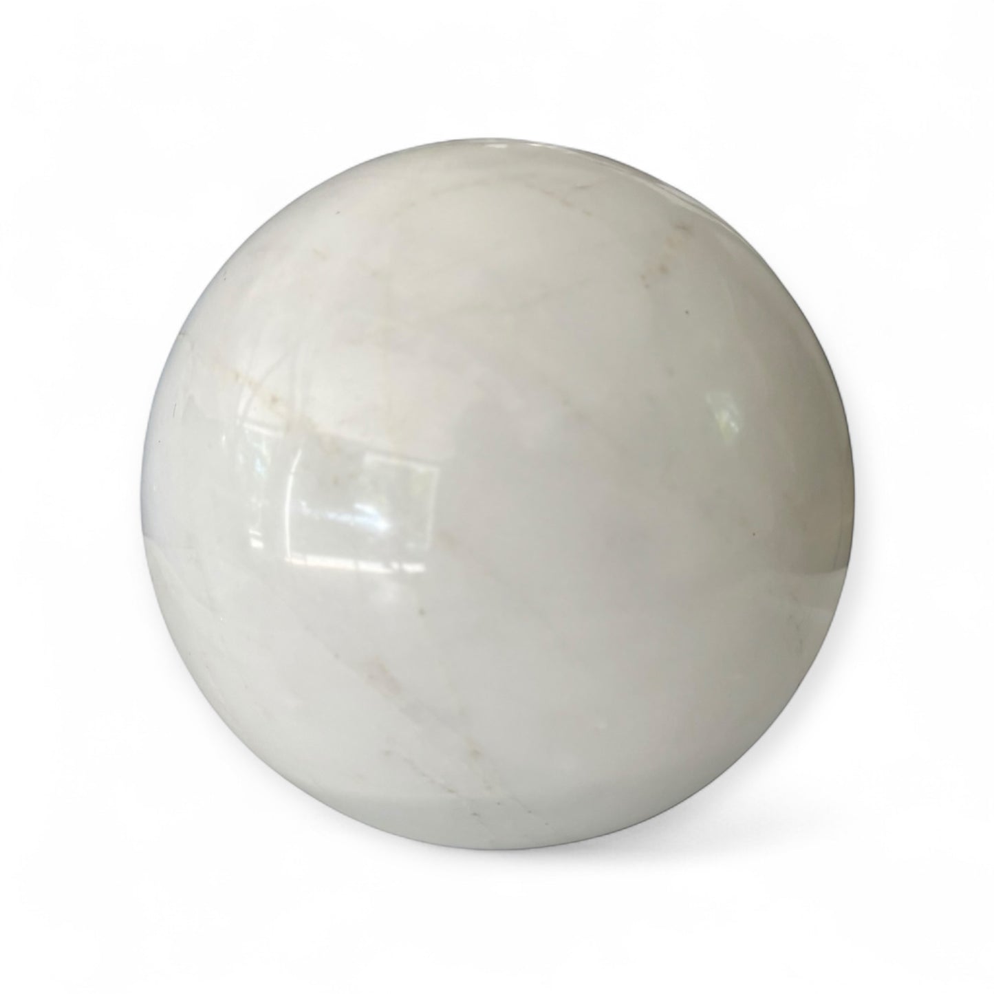 Hand-polished natural white marble sphere with soft veining