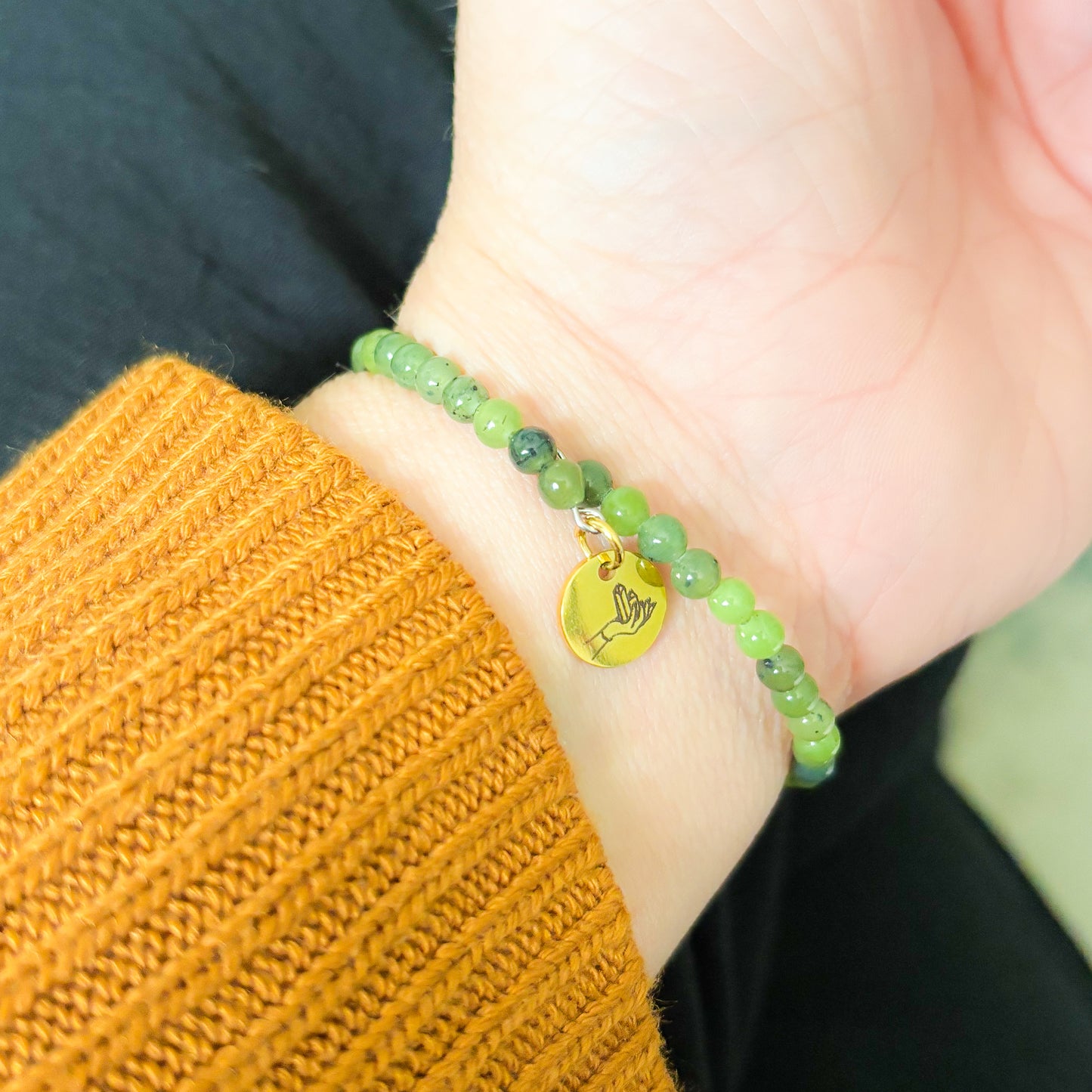 Flexible stainless steel band detail on Nephrite Jade wrap bracelet