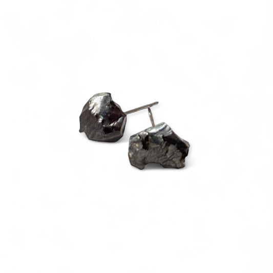 Raw noble shungite stud earrings with stainless steel posts, front view on white background