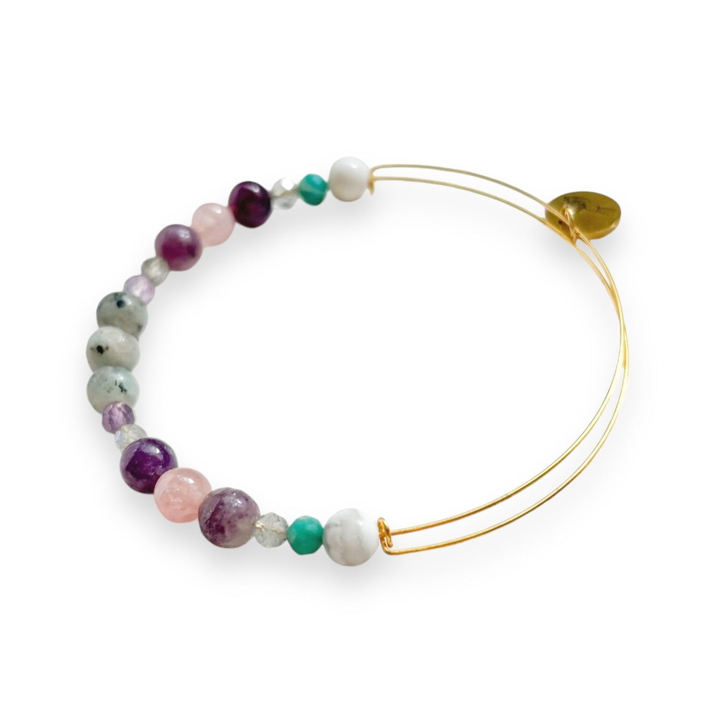 Close-up of Lepidolite, Kiwi Jasper, and Rose Quartz beads