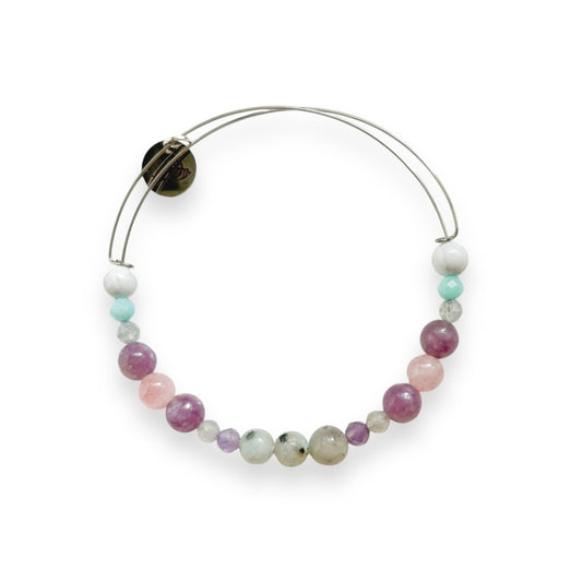Patience Crystal Bracelet with calming pastel and earth-toned gemstones on white background