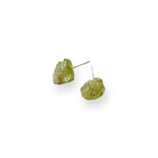Rough Peridot earrings displayed on white background for August birthstone jewelry
