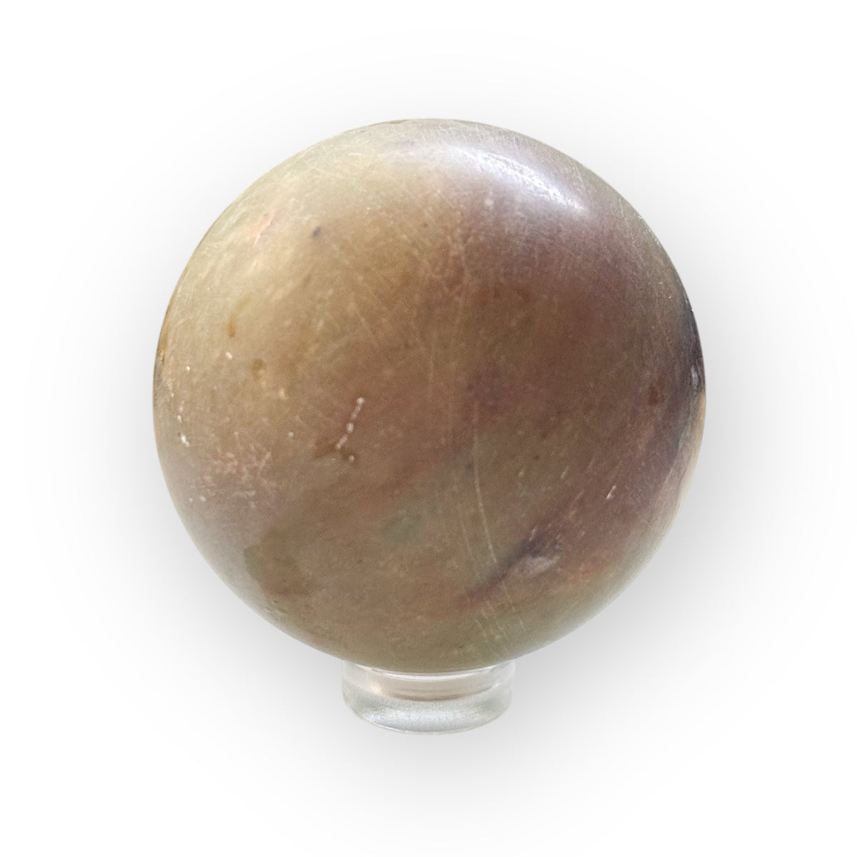 Side angle of a matte Polychrome Jasper Sphere with natural markings