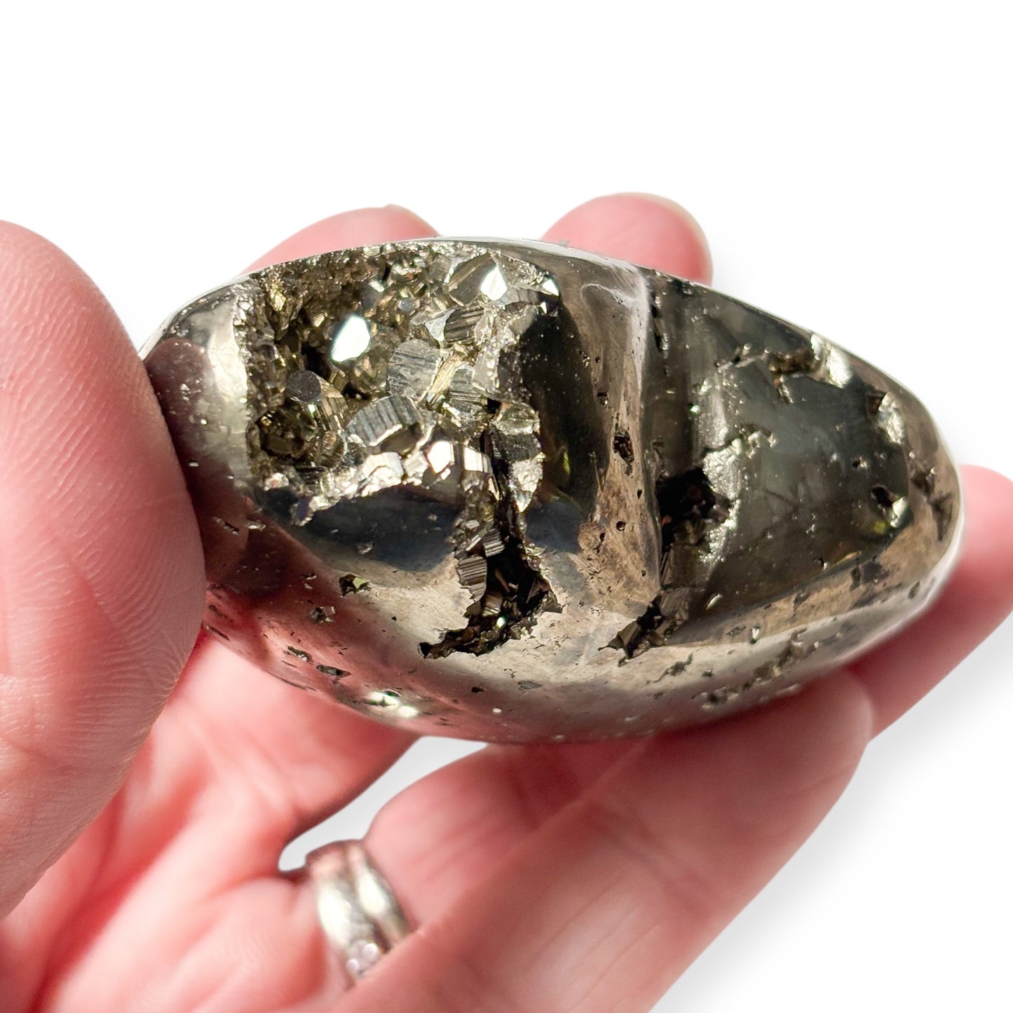 Back of Pyrite heart showing natural texture and golden crystal surface