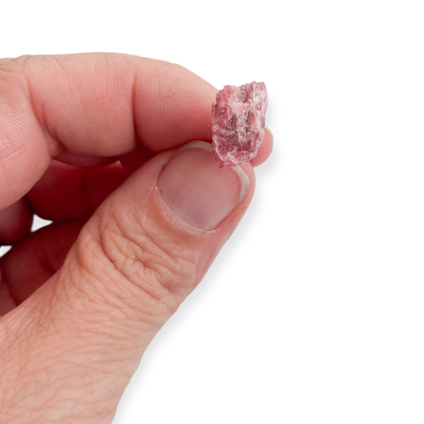 Handcrafted rhodonite stud earrings shown up close
