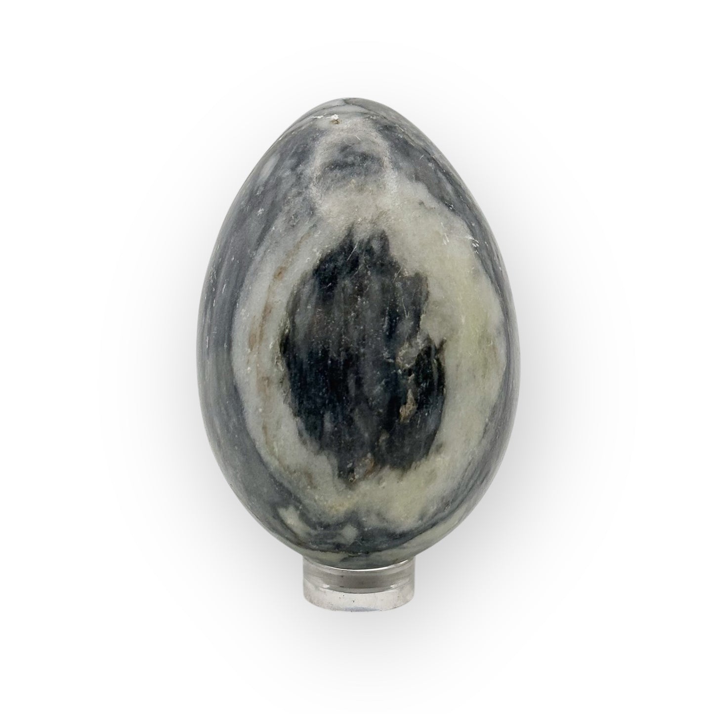 Side view of medium Rhyolite egg with natural marbling and grounding crystal energy