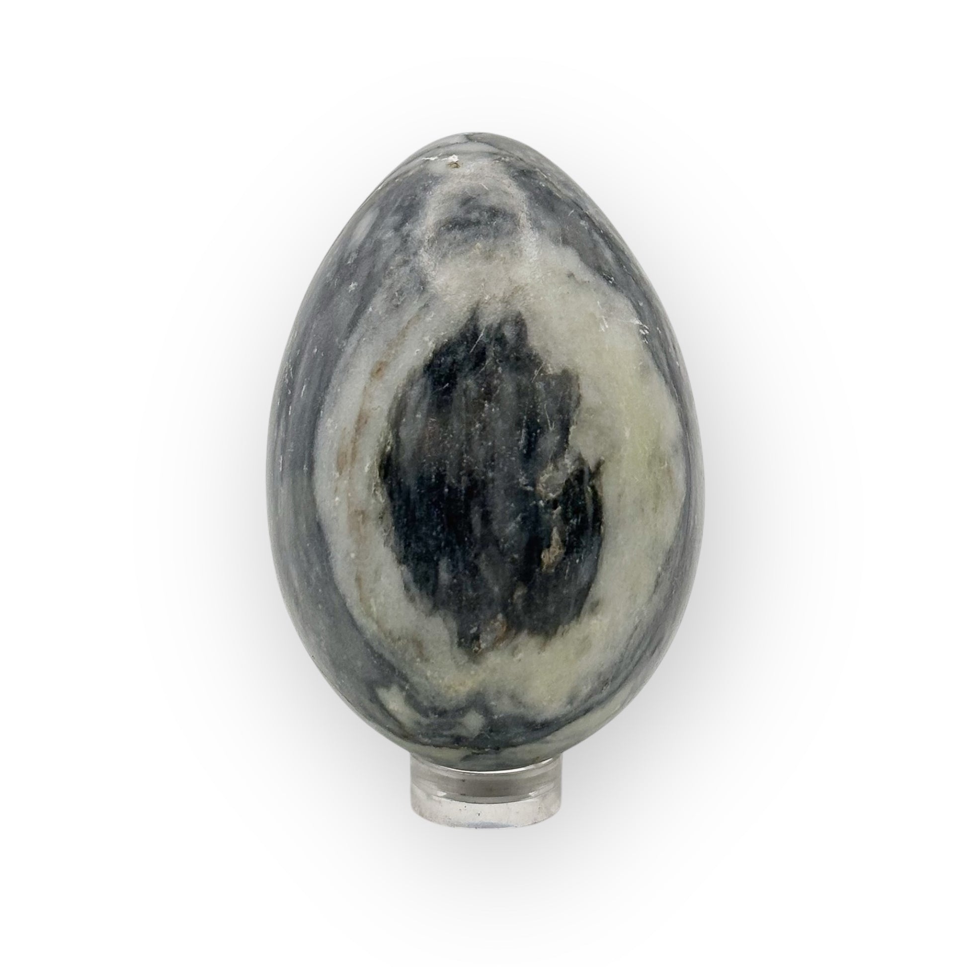 Side view of medium Rhyolite egg with natural marbling and grounding crystal energy
