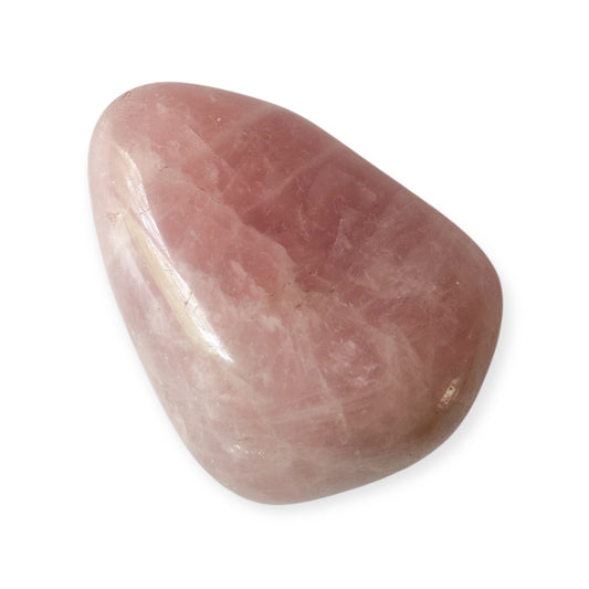 Side angle of medium Rose Quartz highlighting natural shape and subtle marbling