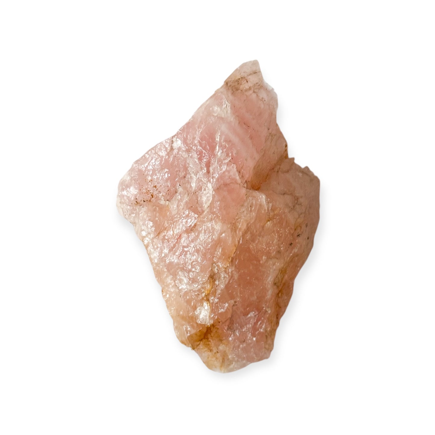 Side view of Rose Quartz rough showing surface detail and shimmer