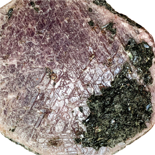 Close-up of Ruby Record Keeper crystal with natural triangular etchings