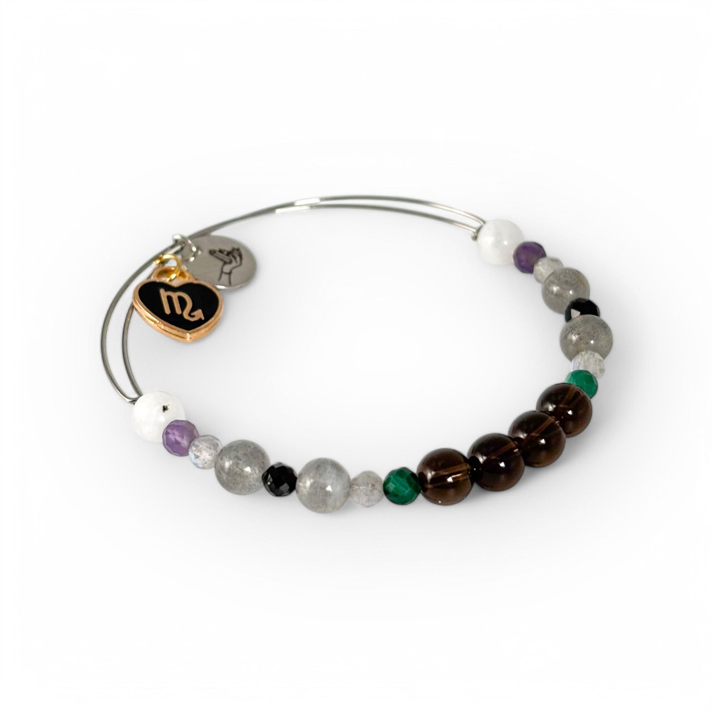 Close-up of Scorpio Crystal Charm Bracelet with a black charm, highlighting its deep, rich crystal tones.