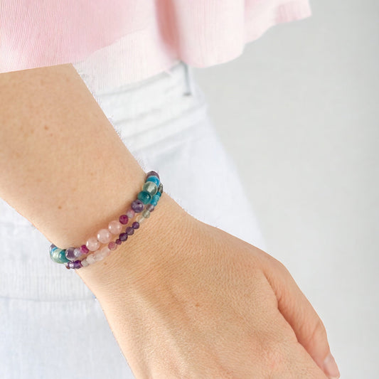 Serenity crystal bracelet stacked on wrist, showing pastel beads for calm and clarity