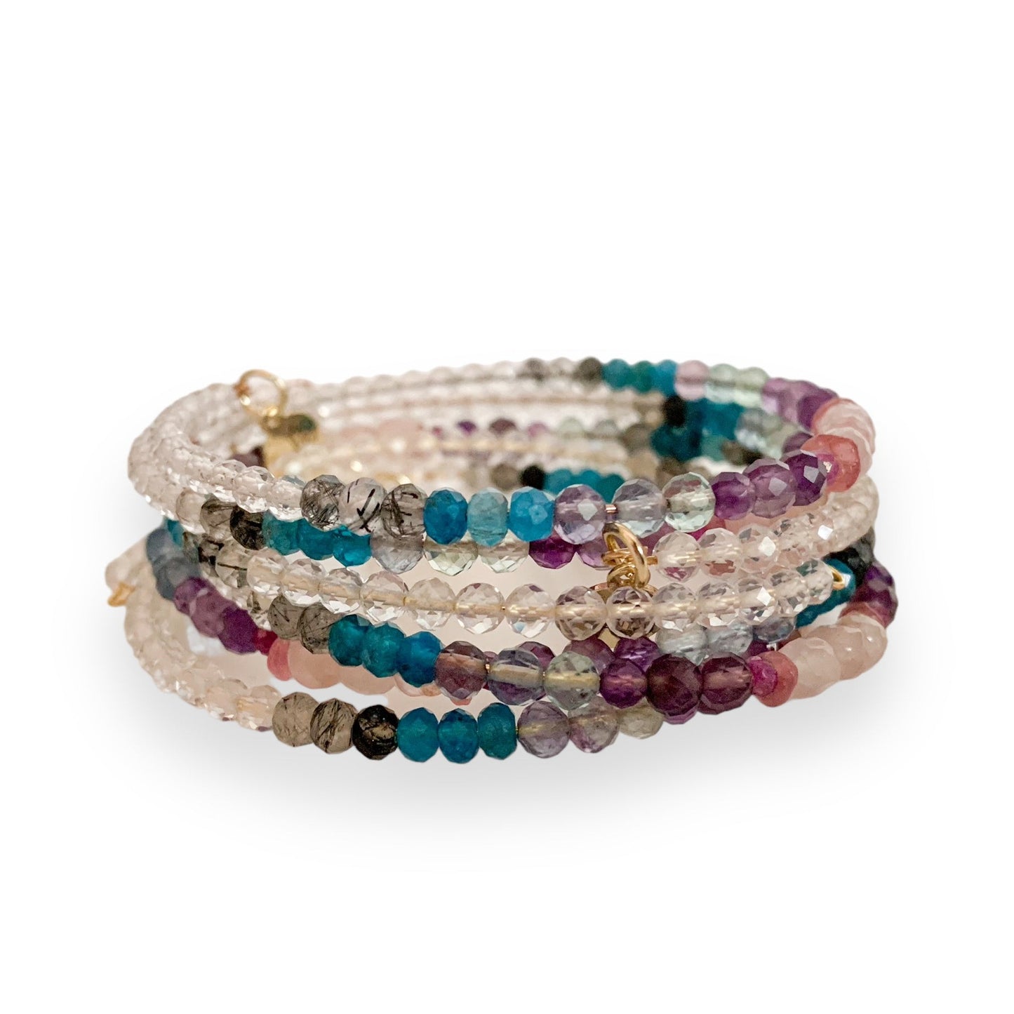 Serenity Wrap Bracelet styled in a stack with other intention-based crystal wraps