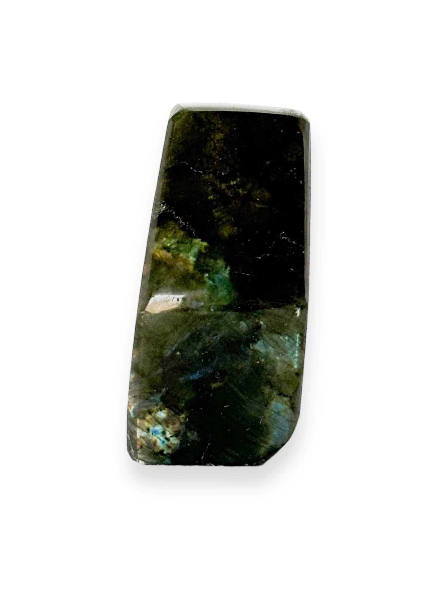 Spectrolite free form crystal displayed on white background