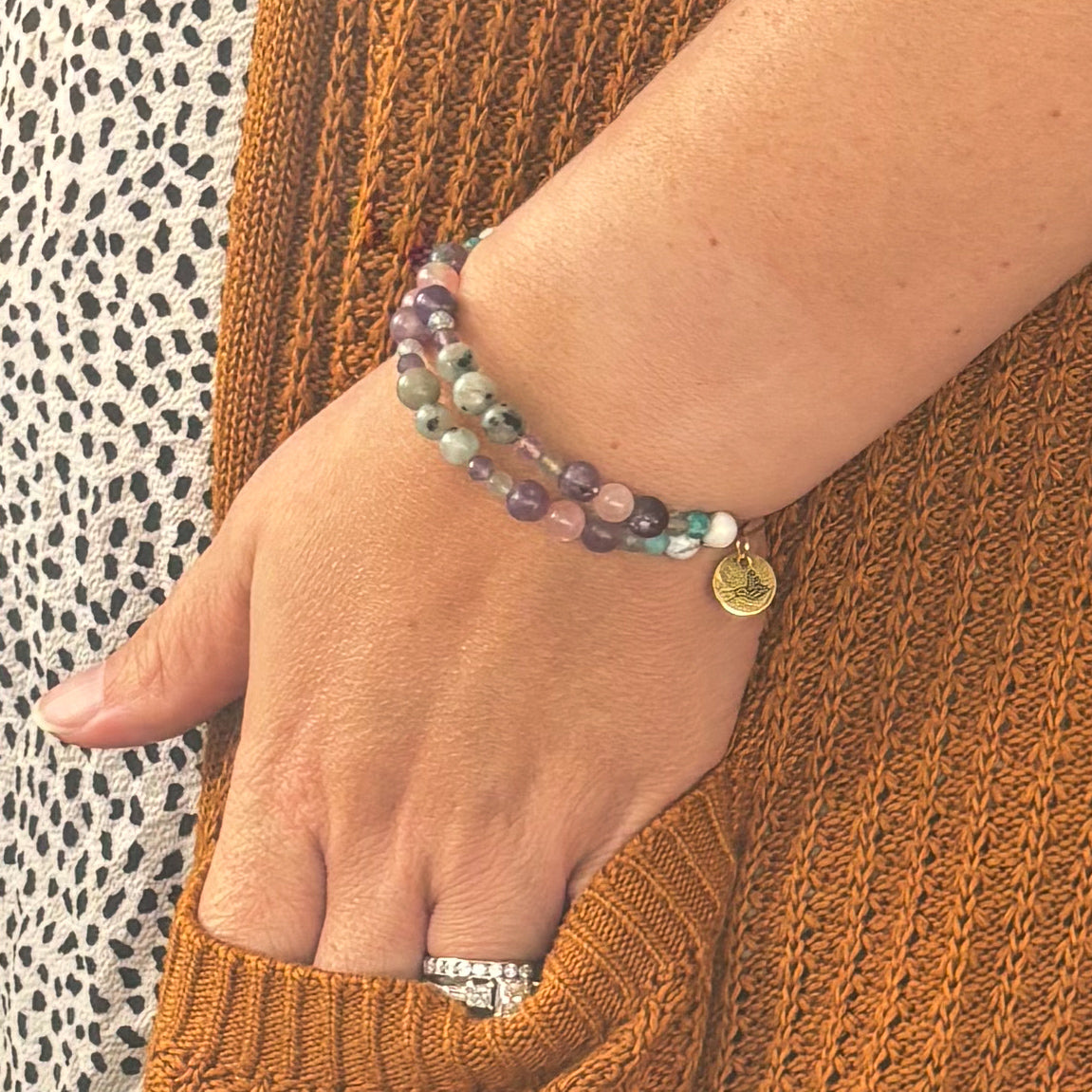 Stacked bracelet pairing with Moonstone and Clear Quartz for balance