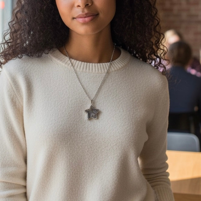 AI Model wearing a star drusy silver plated pendant necklace on an 18.5 inch stainless steel chain