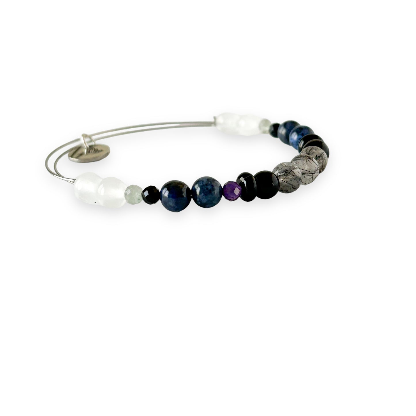 Close-up of Strength Bracelet beads with Tourmalinated Quartz and Sardonyx